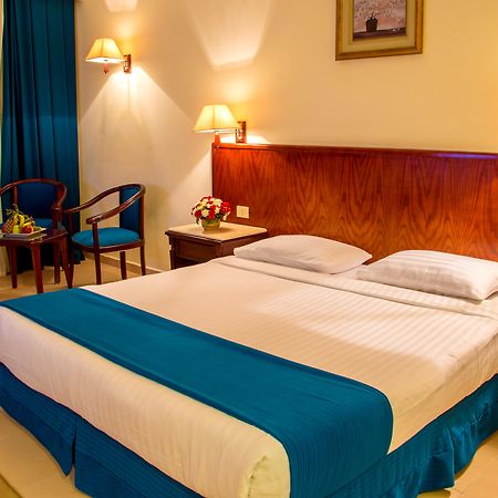 Serenity Alpha Beach - Ex Serenity Makadi Beach Eksteriør billede A bedroom in a hotel
